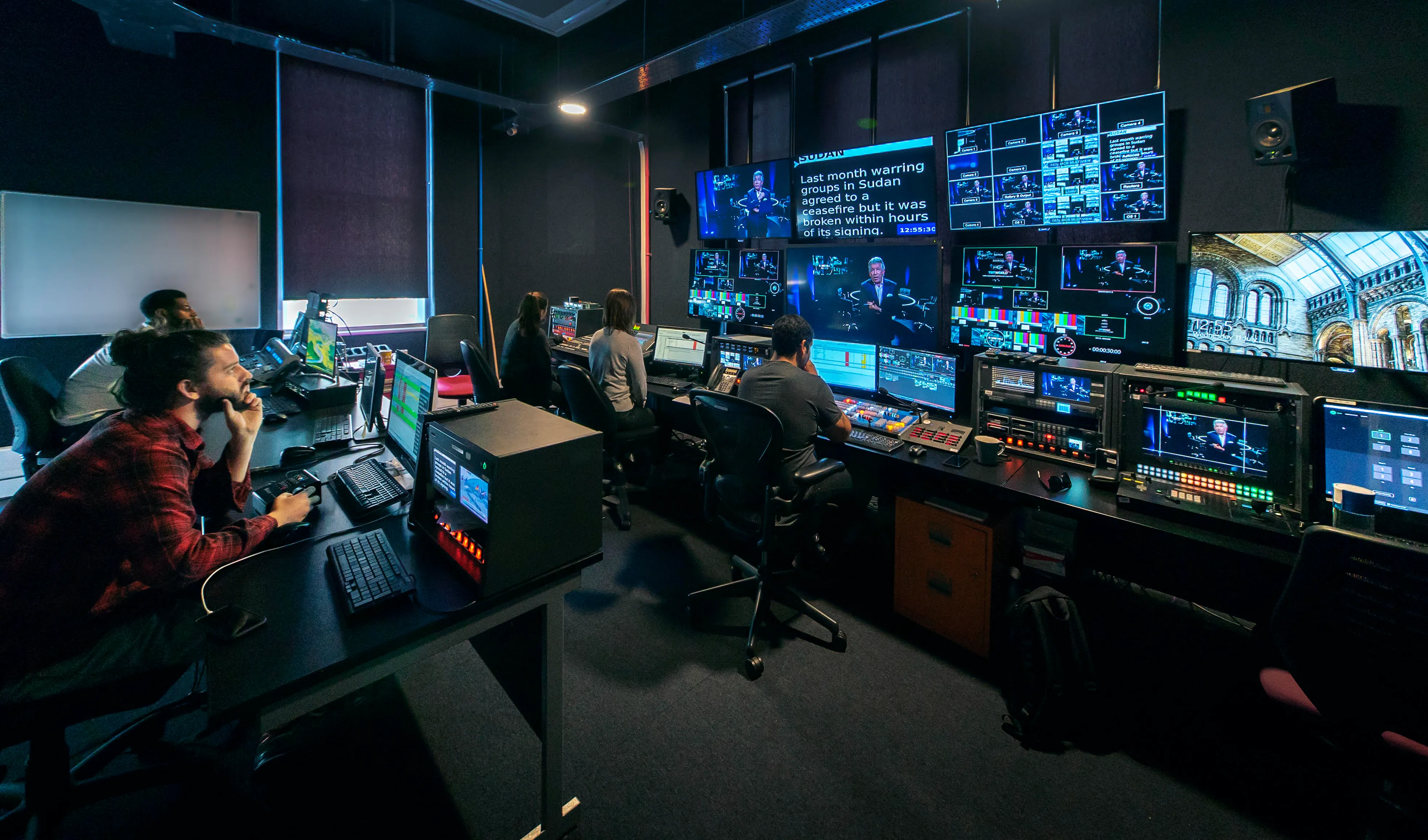 White canvas laptop sleeve with gray felt interior, silver zipper, and tan leather zipper pull.