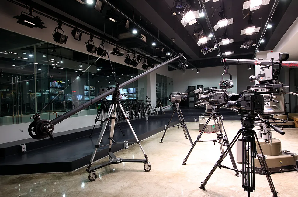 White canvas laptop sleeve with gray felt interior, silver zipper, and tan leather zipper pull.